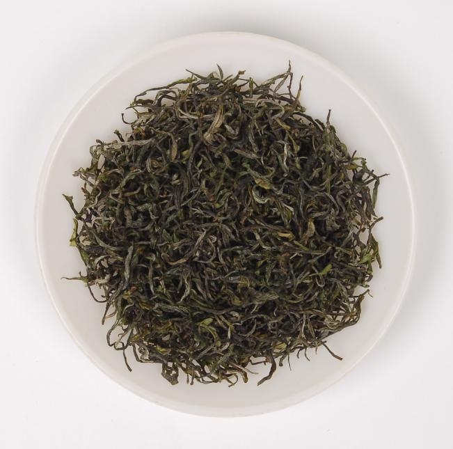 Urina lisamente o chá de Huangshan Maofeng, chá verde amarelado de Huang Shan Mao Feng do verde