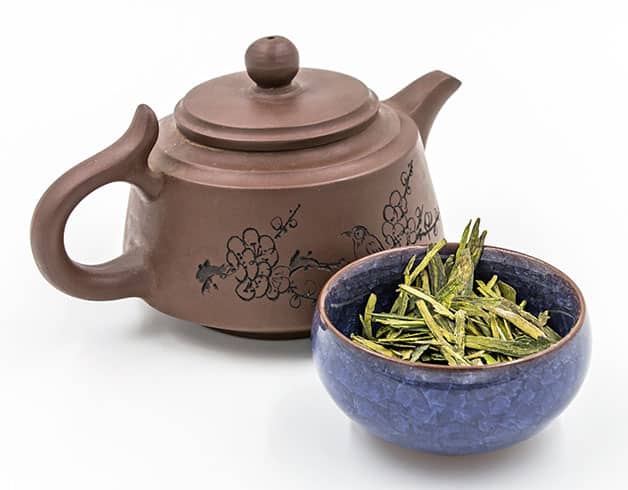a vitamina longjing C do chá de wu do jia do mei dos antioxidantes e os ácidos aminados melhoram a saúde