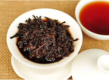 China Chá fermentado cargo do plutônio Erh de Sheng com o anti inflamatório da cor castanha-aloirada acastanhada fábrica